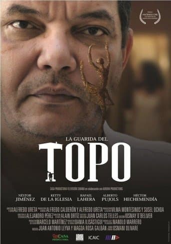 Movie poster for La guarida del topo