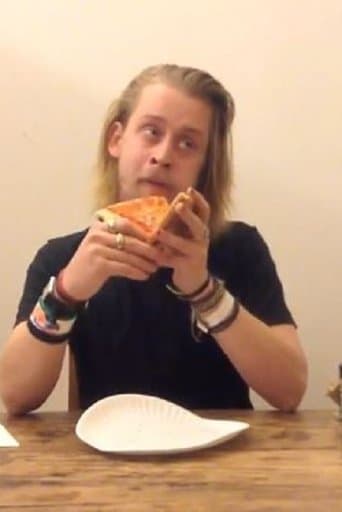Movie poster for Macaulay Culkin Eating a Slice of Pizza